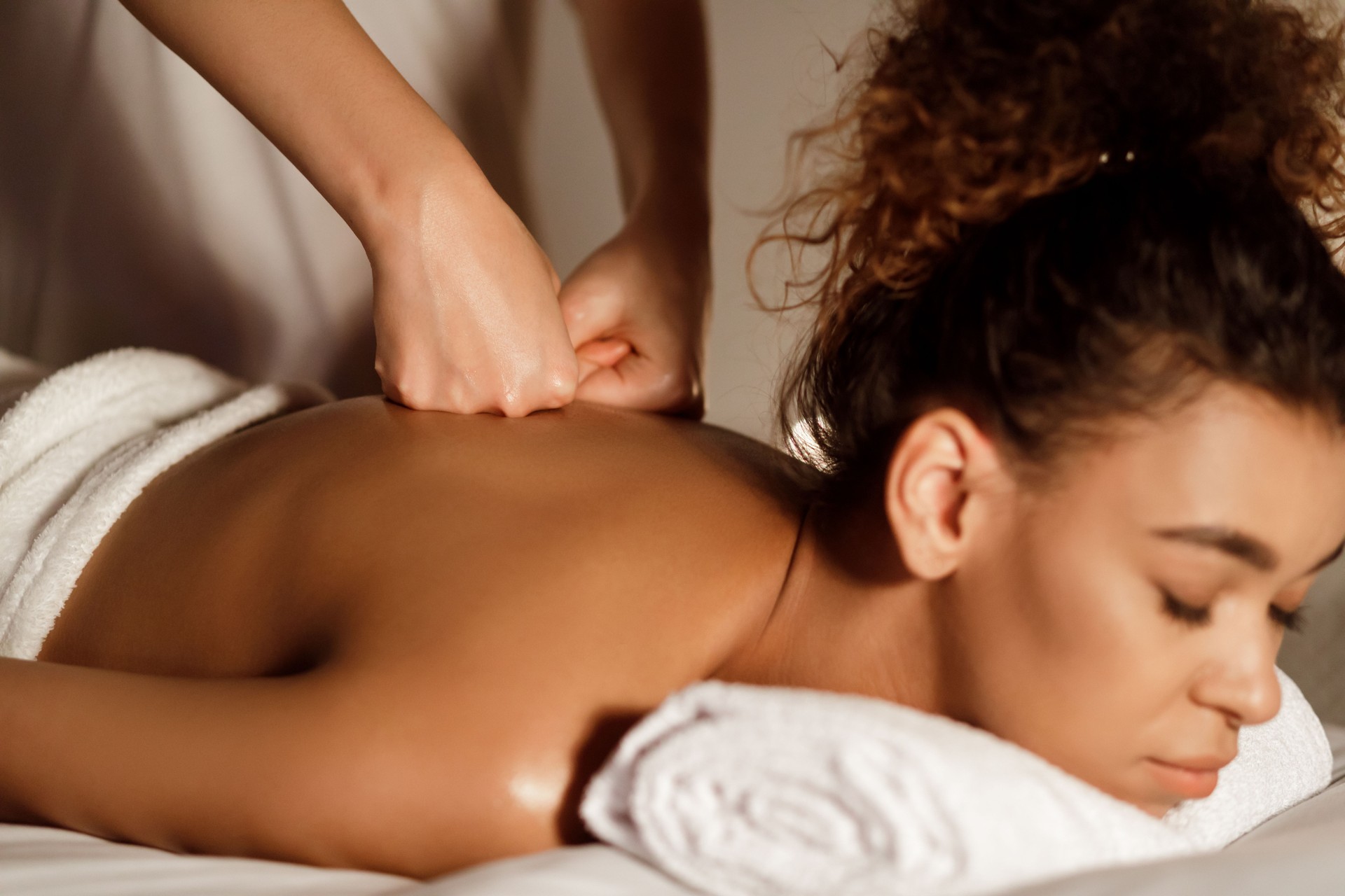 Relaxation and Healing Through Massage Therapy at a Wellness Spa in the Afternoon